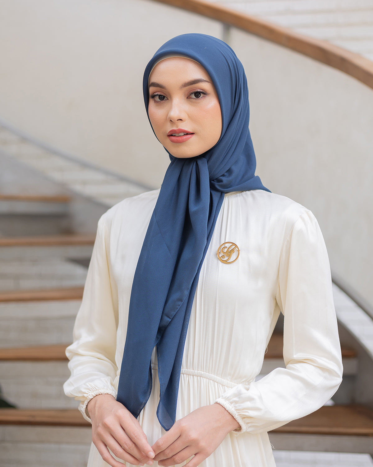Naima Scraf in Copper Blue