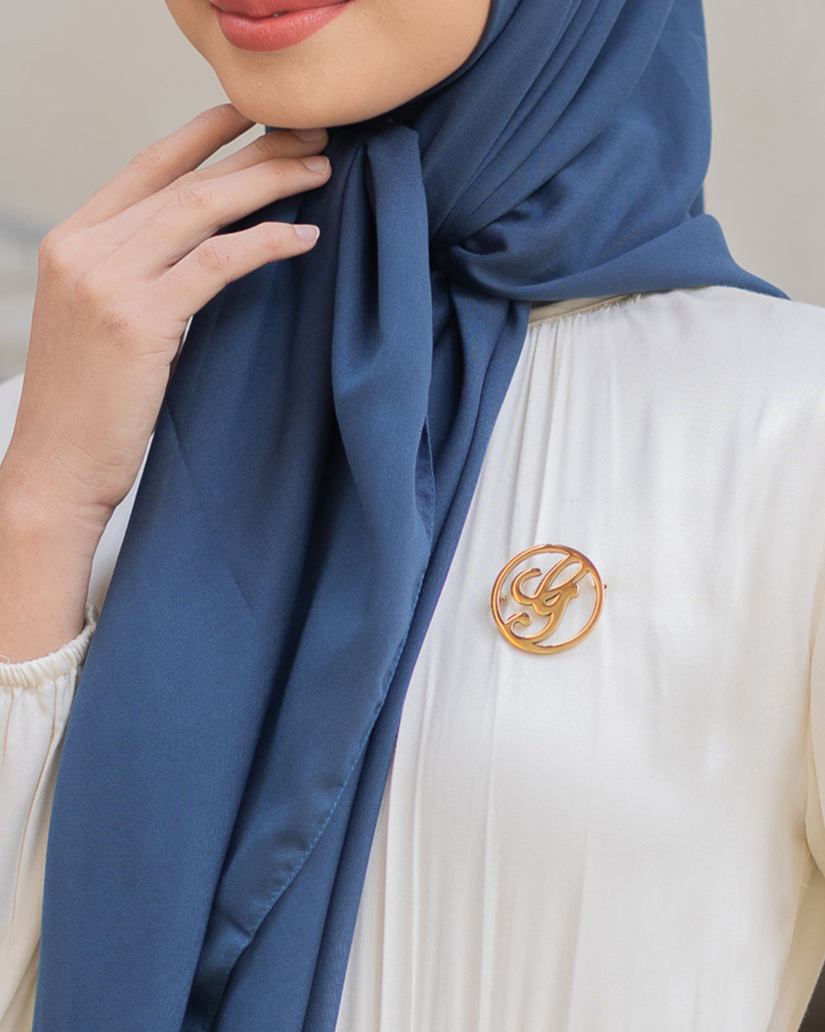 Naima Scraf in Copper Blue